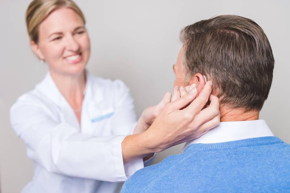 Fitting hearing aid in ear